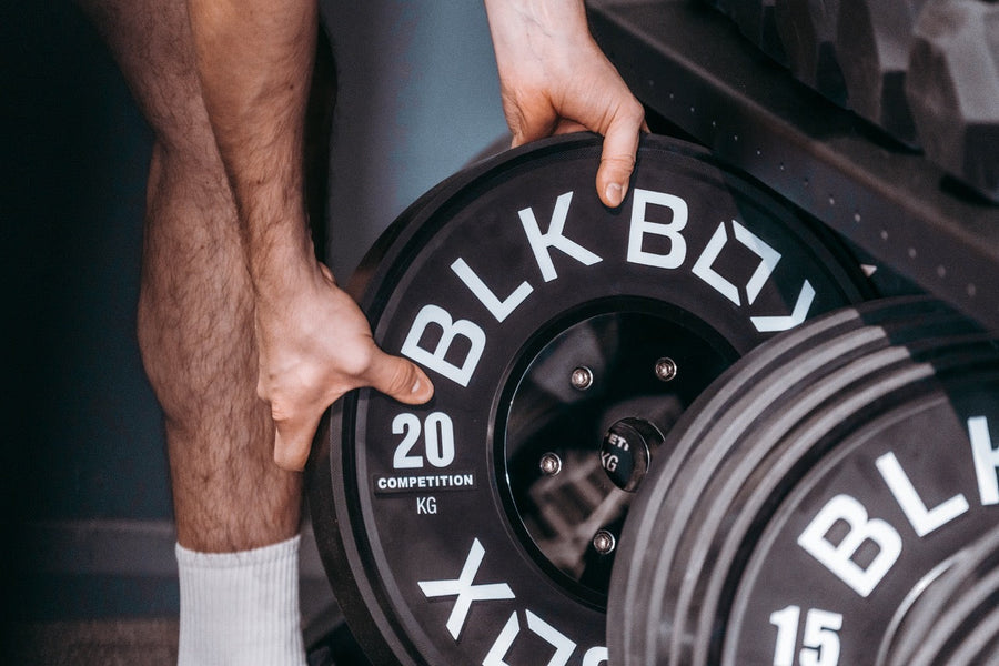 The benefits of bumper plates vs. Iron plates for strength training