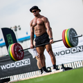 man using BLK BOX weight plates