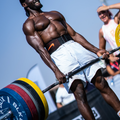 man using BLK BOX weight plates